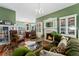 Cozy living room with a fireplace, built-in bookshelves, and comfortable seating at 1154 N Clarkson St, Denver, CO 80218