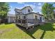 Backyard with a deck and green grass at 13457 Glen Cir, Broomfield, CO 80020