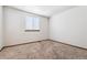 Bedroom with carpeted floor and a window that brings natural light at 13457 Glen Cir, Broomfield, CO 80020