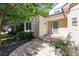 Inviting front entrance featuring a stone walkway and brick accents at 13457 Glen Cir, Broomfield, CO 80020