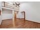 Open-concept living room featuring wood floors and vaulted ceilings at 13457 Glen Cir, Broomfield, CO 80020