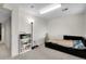 Bedroom with carpet, bookcase, and open doorway at 2659 S Halifax St, Aurora, CO 80013