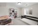 Bedroom featuring carpet, window, and two beds at 2659 S Halifax St, Aurora, CO 80013