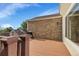 Wooden deck featuring stone accents and a grill, perfect for outdoor entertaining and enjoying scenic views at 2659 S Halifax St, Aurora, CO 80013
