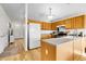 Spacious kitchen featuring light cabinets, stainless steel appliances, and light counter tops at 2659 S Halifax St, Aurora, CO 80013