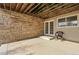 This concrete patio features stone accents, and direct access to the backyard, creating a relaxing outdoor retreat at 2659 S Halifax St, Aurora, CO 80013