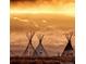 Scenic landscape featuring tepees with a breathtaking view of snow-capped mountains under a dramatic sky at sunset at 2659 S Halifax St, Aurora, CO 80013