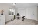 Well-equipped workout room featuring exercise equipment and a cabinet, perfect for staying active at home at 2659 S Halifax St, Aurora, CO 80013