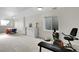 Bright workout room featuring exercise equipment and natural light from multiple windows for a healthy lifestyle at 2659 S Halifax St, Aurora, CO 80013
