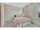 Bright bedroom with carpet flooring, neutral walls, and bright natural light at 1100 N Marion St # 4, Denver, CO 80218