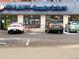 Exterior view of Snarf's Sandwiches with cars parked in the parking lot at 1100 N Marion St # 4, Denver, CO 80218