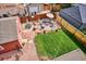 Spacious backyard with patio, lawn, and seating area at 1800 S Sherman St, Denver, CO 80210