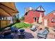 Relaxing patio with seating area and grassy lawn at 1800 S Sherman St, Denver, CO 80210