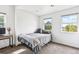 Bright bedroom with double bed, window seat and TV at 1800 S Sherman St, Denver, CO 80210