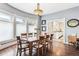 Elegant dining area with hardwood floors and large windows at 1800 S Sherman St, Denver, CO 80210