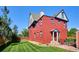 Brick house with green lawn and walkway at 1800 S Sherman St, Denver, CO 80210
