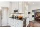 Well-equipped kitchen with ample cabinetry and a wine cooler at 1800 S Sherman St, Denver, CO 80210