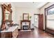 Charming living room with hardwood floors and a decorative fireplace at 1800 S Sherman St, Denver, CO 80210