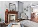 Fireplace with ornate mantel in a living room at 1800 S Sherman St, Denver, CO 80210