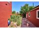 Landscaped side yard with stone path and flowers at 1800 S Sherman St, Denver, CO 80210