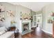 Sitting area with fireplace, hardwood floors and access to bedroom at 1800 S Sherman St, Denver, CO 80210