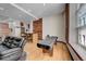 Spacious living area featuring exposed wood, rustic elements, and an open layout at 720 16Th St # 421, Denver, CO 80202