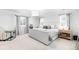Serene main bedroom with neutral tones, large windows, and stylish furnishings at 777 Gold Hill Dr, Erie, CO 80516