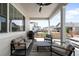 Enjoy outdoor living on this covered patio, complete with comfortable seating and a grill at 777 Gold Hill Dr, Erie, CO 80516