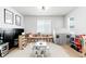 Cozy playroom features a play kitchen, play tent, and plenty of storage for toys at 777 Gold Hill Dr, Erie, CO 80516