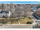 Aerial view of a house and surrounding neighborhood, showcasing the property's location and landscaping at 2 Elm St, Denver, CO 80220