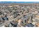 Expansive aerial view showcasing the property, neighborhood, and distant mountain views at 2 Elm St, Denver, CO 80220