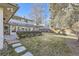 Spacious backyard with patio, mature trees and privacy fence at 2 Elm St, Denver, CO 80220