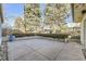 Landscaped backyard with patio, mature trees and plenty of space for outdoor entertaining at 2 Elm St, Denver, CO 80220