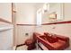 Retro bathroom with red sink and tiled shower at 2 Elm St, Denver, CO 80220