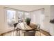 Bright dining area with natural light and a view to the outdoors at 2 Elm St, Denver, CO 80220