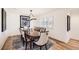 Elegant dining room with hardwood floors and a chandelier at 2 Elm St, Denver, CO 80220