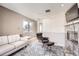Comfortable living room offers a fireplace and plenty of space for seating at 2 Elm St, Denver, CO 80220