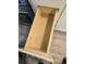 Open drawer with dovetail joints and wood construction at 6948 W 70Th Ave, Arvada, CO 80003