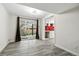 Basement kitchenette area with white cabinetry, and stainless steel appliances at 6948 W 70Th Ave, Arvada, CO 80003