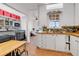 Functional kitchen with light-colored cabinets, a butcher block countertop, and stainless steel appliances at 15205 W 43Rd Ave, Golden, CO 80403