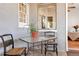 Cozy patio with table, seating, and view into the main room at 15205 W 43Rd Ave, Golden, CO 80403