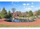 Outdoor community area with water feature and garden at 2500 S York St # 410, Denver, CO 80210