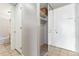 Hallway with closet, and access to the bathroom offering practical storage solutions at 2500 S York St # 410, Denver, CO 80210