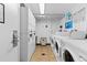 The on-site laundry room features multiple washers and dryers at 2500 S York St # 410, Denver, CO 80210