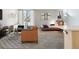 Bright and stylish living area with contemporary furnishings, a comfortable bed, and ample natural light at 2500 S York St # 410, Denver, CO 80210