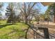 Close to playground with mature trees, grass, and playground equipment at 2500 S York St # 410, Denver, CO 80210