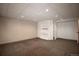 Spacious finished basement with recessed lighting and carpeted flooring at 11205 Holly St, Thornton, CO 80233