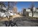 Community shot showing visitor parking area and well maintained landscaping at 11205 Holly St, Thornton, CO 80233
