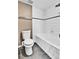 Bright bathroom featuring updated fixtures and subway tile surround at 14204 E Radcliff Cir, Aurora, CO 80015