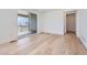 Spacious bedroom with sliding glass door to outdoor deck at 4652 Windmill Dr, Brighton, CO 80601